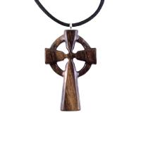 A brown wooden celtic cross pendant with black cord with glossy finish.