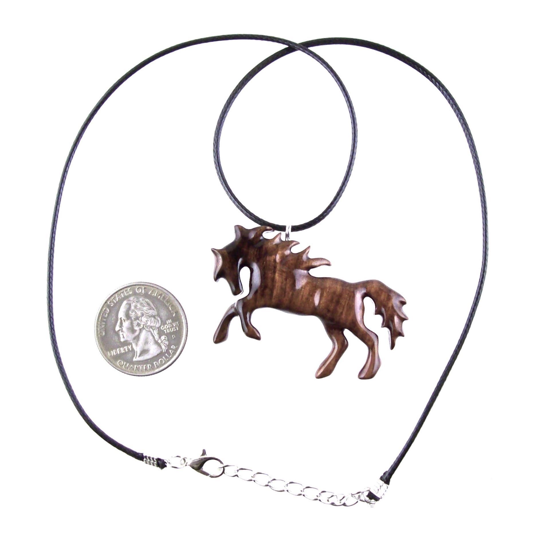 A wooden horse pendant necklace with a black cord and silver lobster clasp. The horse is brown and has a detailed mane and tail.